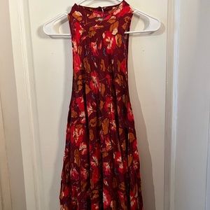 Red Free People patterned tunic.